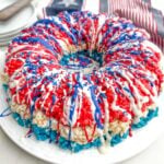 4th of july rice krispie treats bundt cake on a white plate.