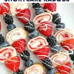 strawberry shortcake kabobs on a white plate.