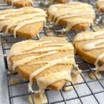 brown sugar cookies with maple icing on a wire rack.
