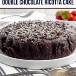 chocolate ricotta cake on a white plate.