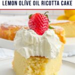 a piece of lemon ricotta cake on a white plate topped with whipped cream.