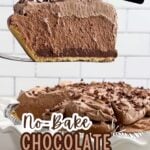 pie server lifting a piece of chocolate mousse pie over the rest of the pie.