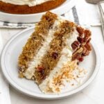slice of hummingbird cake on a white plate.