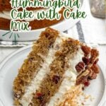 slice of hummingbird cake with cake mix on a white plate.