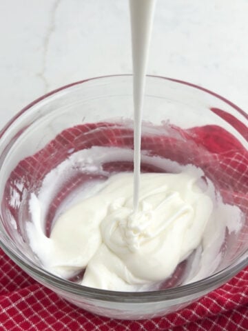 gingerbread cookie frosting in a clear bowl.