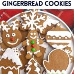 soft gingerbread cookies with icing on a white plate.