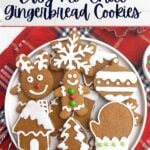 soft gingerbread cookies with icing on a white plate.