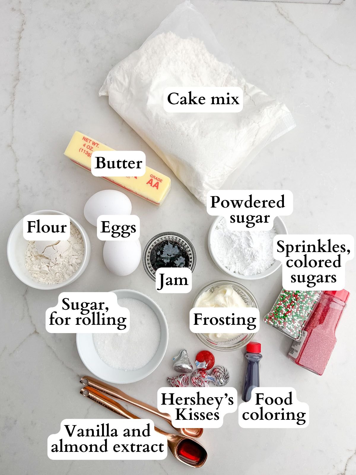 ingredients to make various types of cake mix Christmas cookies.