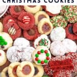 variety of cake mix christmas cookies on a wooden cutting board.