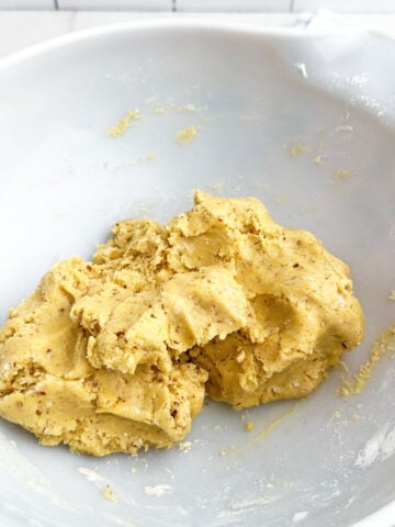 lemon cake mix cookie dough in a white bowl.